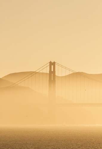california golden gate bridge covered with fog desert